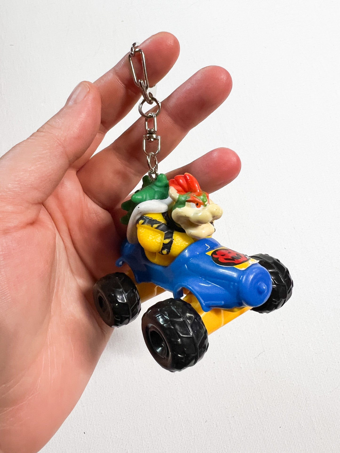 Upcycled Racing Character Keychain – Handmade Reclaimed Toy Accessory
