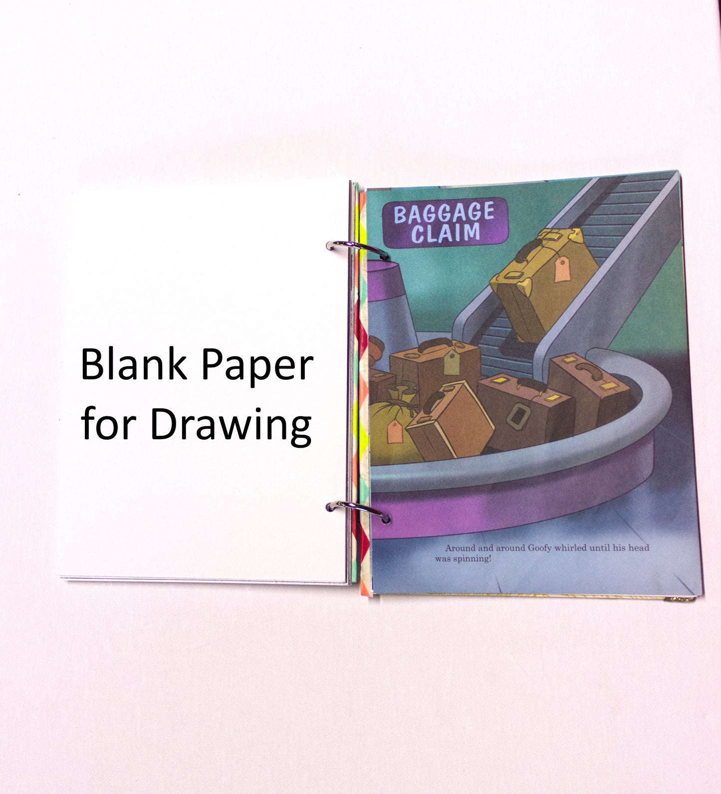 Interior pages of an upcycled Let’s Go to the Airport book journal showing blank pages for journaling and sketching.