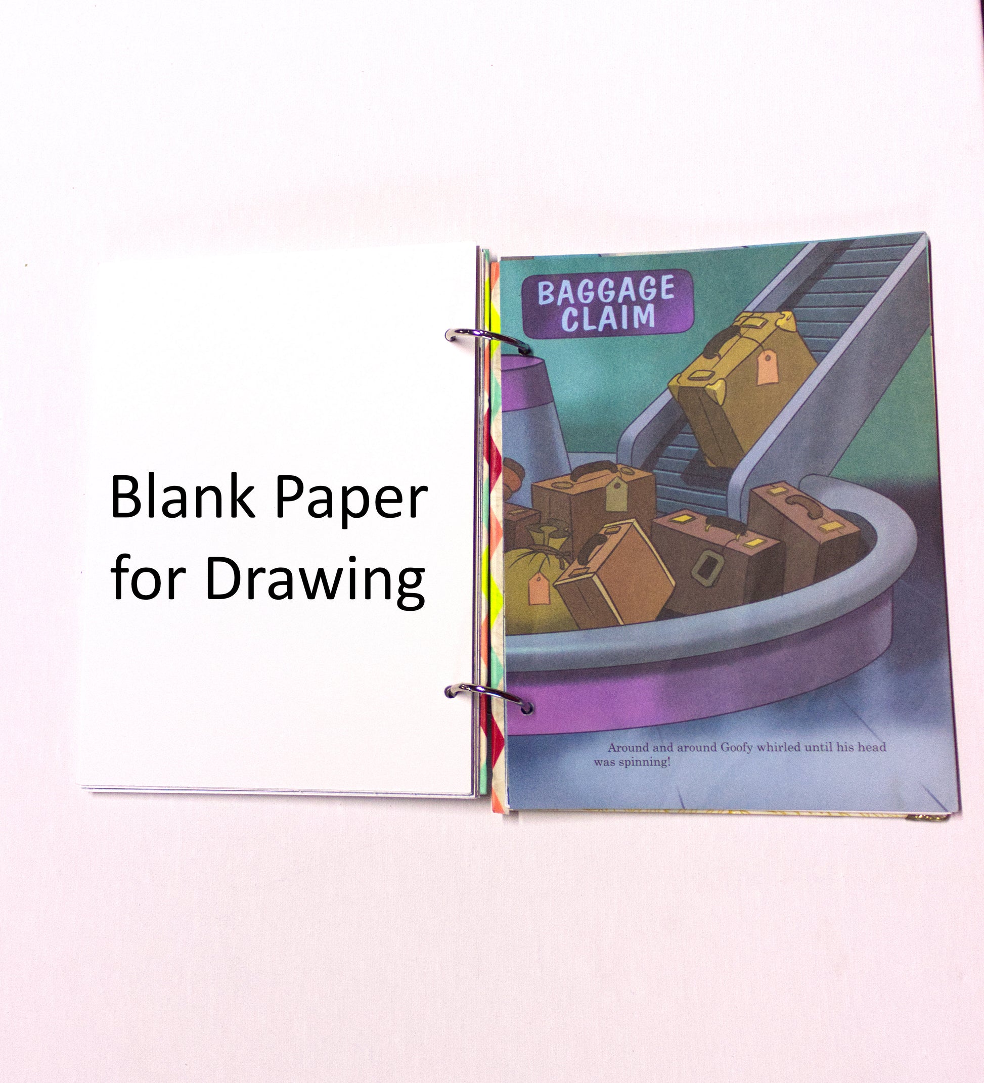 Interior pages of an upcycled Let’s Go to the Airport book journal showing blank pages for journaling and sketching.