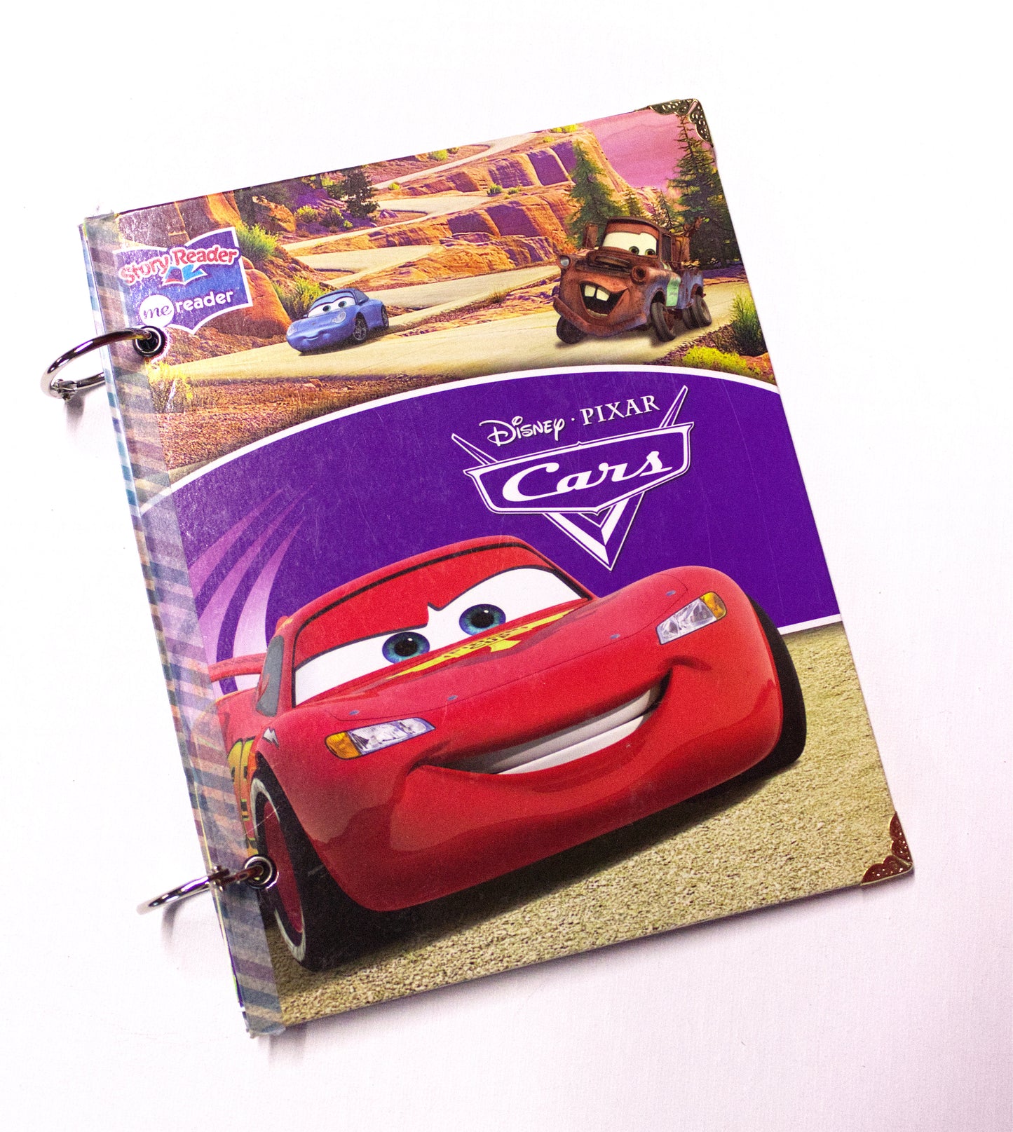 Upcycled children’s book journal made from Cars hardcover, featuring a high octane racecar on the front cover.

