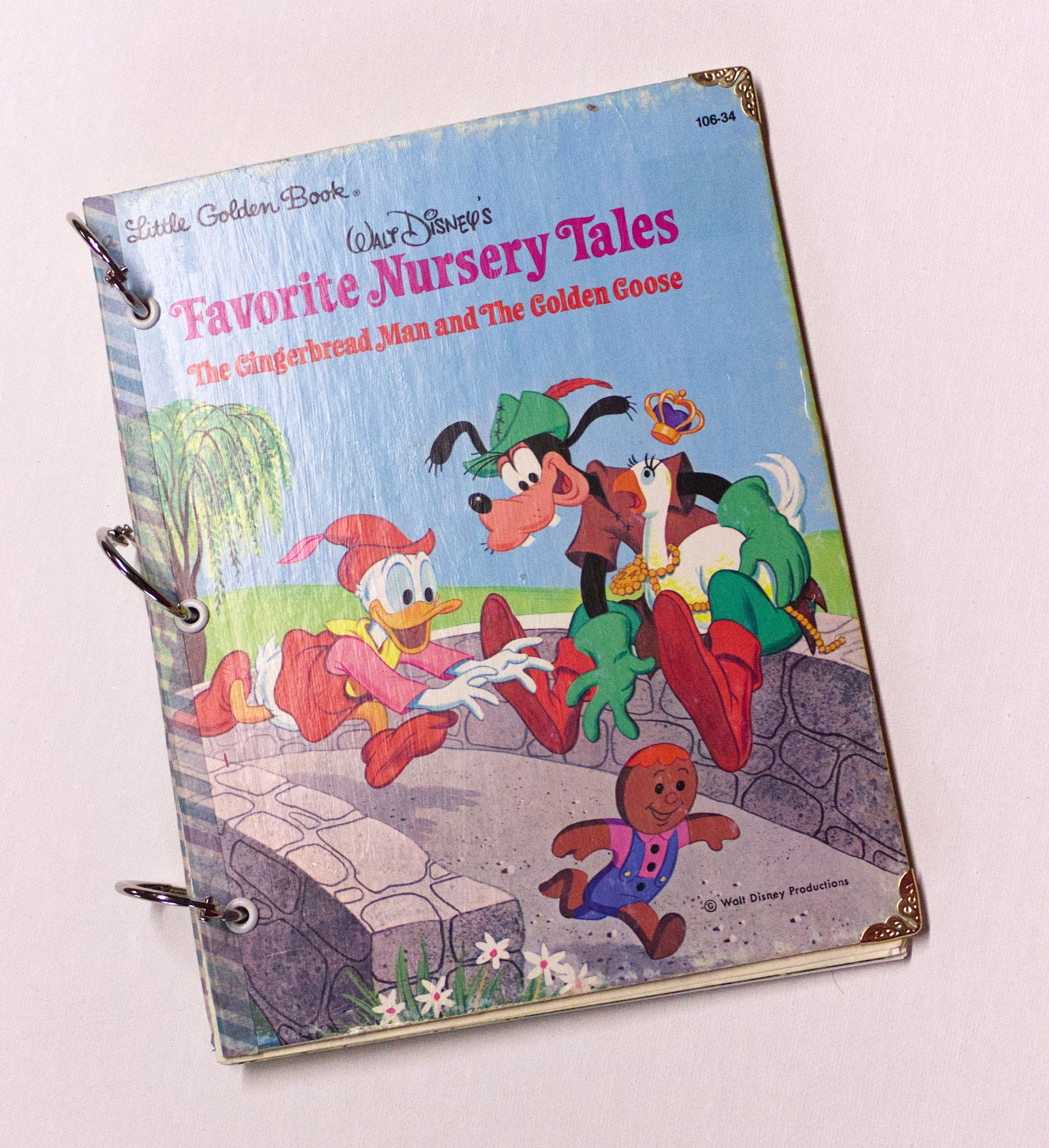 Upcycled children’s book journal made from Favourite Nursery Tales hardcover, featuring Donald Duck and Goofy on the front cover.
