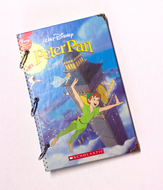 Upcycled children’s book journal made from a Peter Pan hardcover, featuring Peter Pan flying on the front cover.